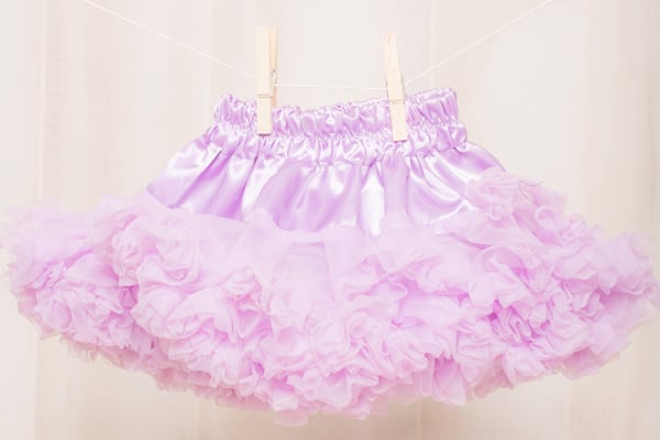 This is a chiffon DIY tutu skirt that is a DIY layered tutu pettiskirt that any girl will love. All you need is a sewing machine. It's super easy to make. This chiffon tutu dress is any little girl's dream!