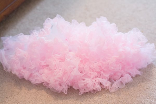 This is a chiffon DIY tutu skirt that is a DIY layered tutu pettiskirt that any girl will love. All you need is a sewing machine. It's super easy to make. This chiffon tutu dress is any little girl's dream!