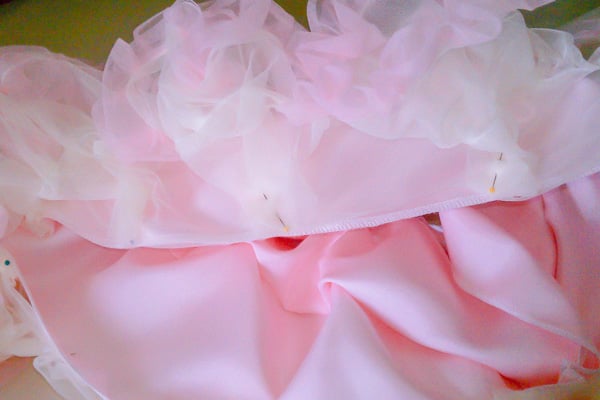 This is a chiffon DIY tutu skirt that is a DIY layered tutu pettiskirt that any girl will love. All you need is a sewing machine. It's super easy to make. This chiffon tutu dress is any little girl's dream!