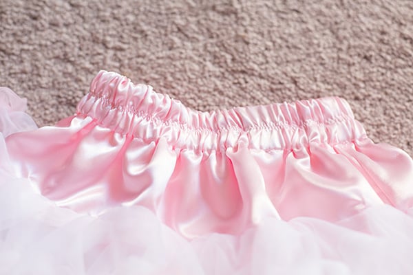 This is a chiffon DIY tutu skirt that is a DIY layered tutu pettiskirt that any girl will love. All you need is a sewing machine. It's super easy to make. This chiffon tutu dress is any little girl's dream!
