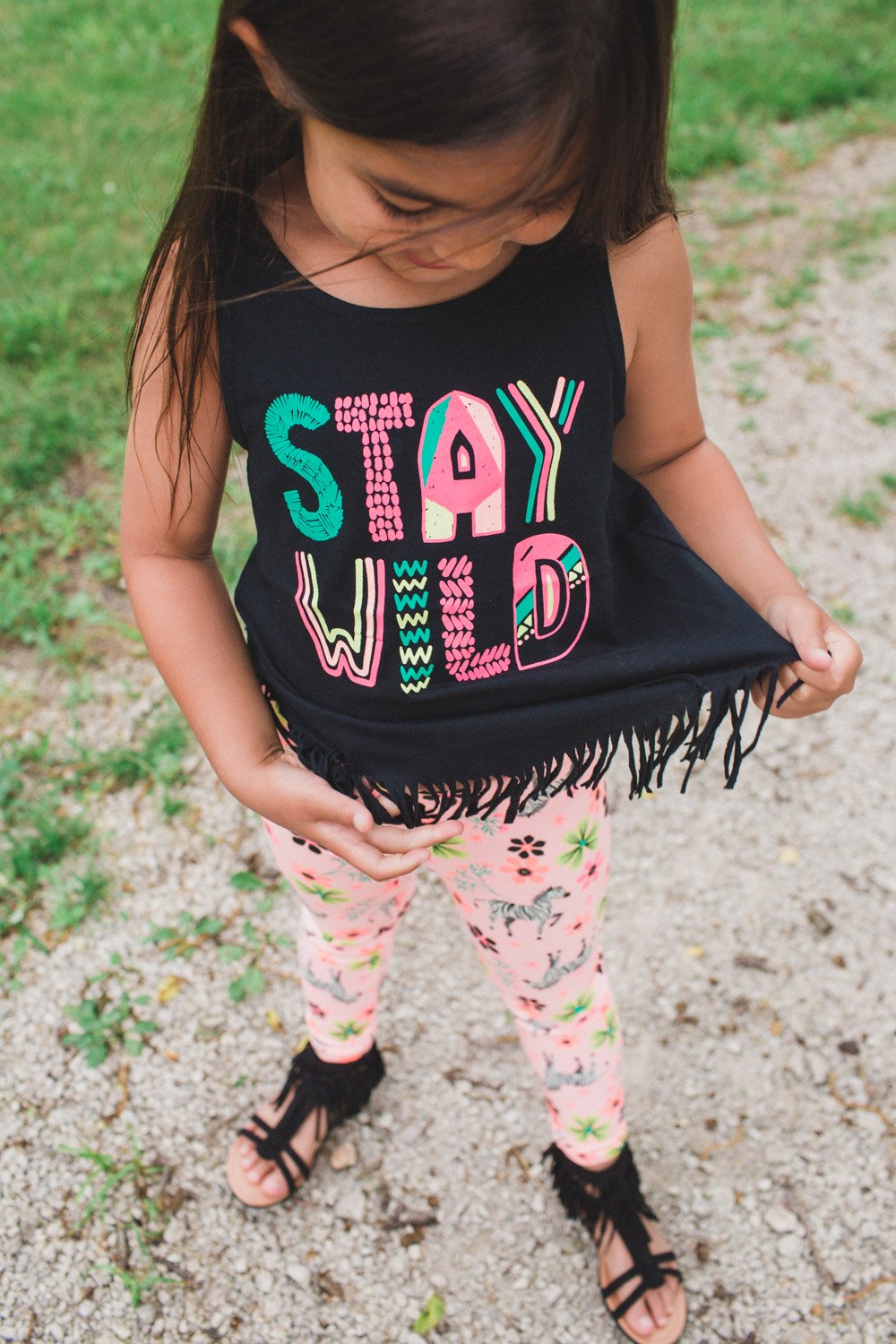 Fringe stay wild shirt with jungle themed leggings and fringe shoes! Super cute and adorable for eight year old girls.