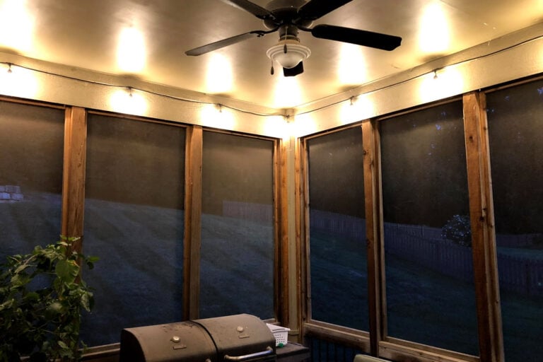 String lights hung under a covered patio