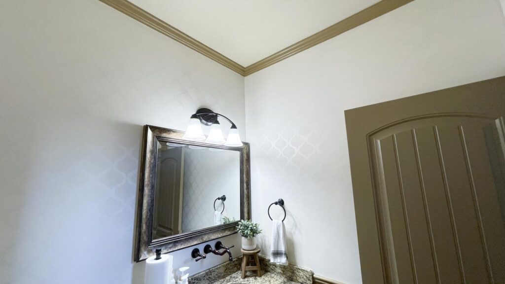 patterned wall bathroom with same color different sheen with mirro, wall, sink