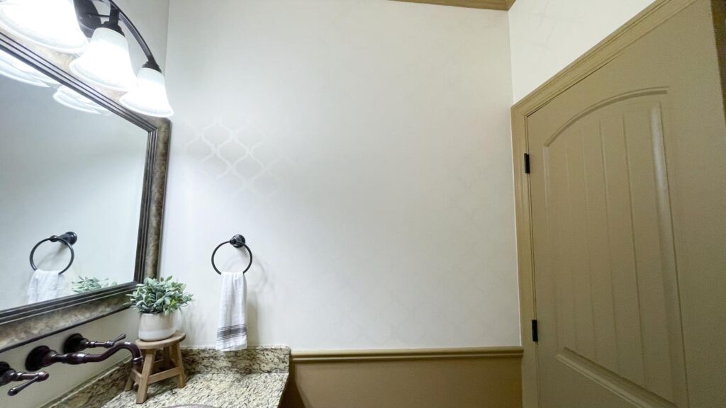 diy wall pattern paint with same color different sheen wall between sink and bathroom door