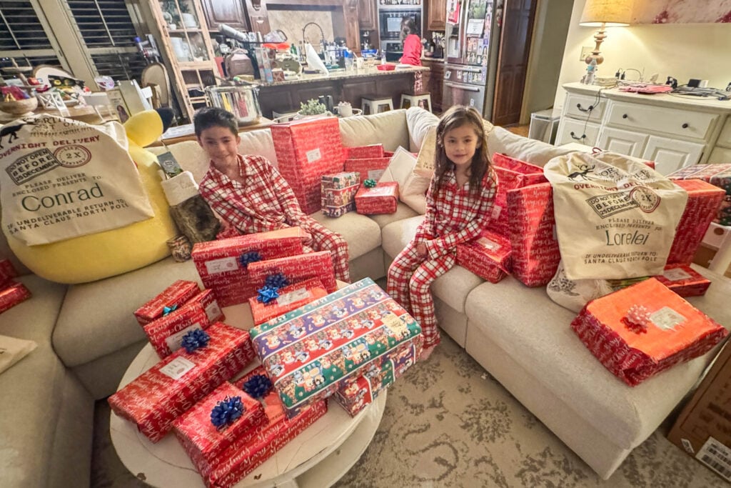 IKEA Finnala sectional during Christmas with kids opening gifts on the sofa