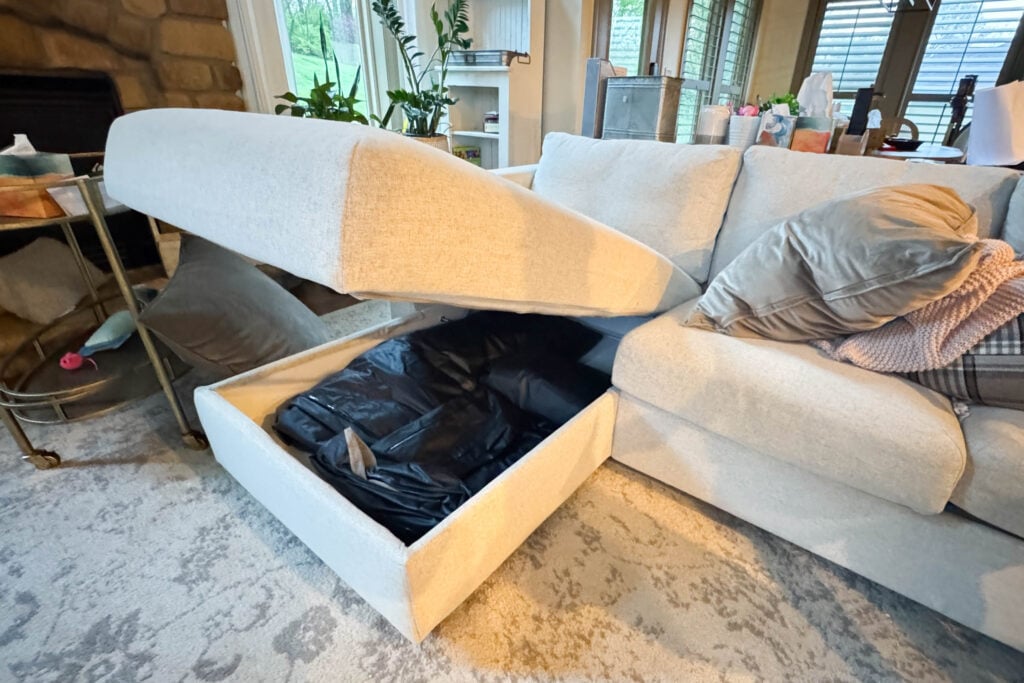 IKEA Finnala ottoman with storage open showing interior space and organization